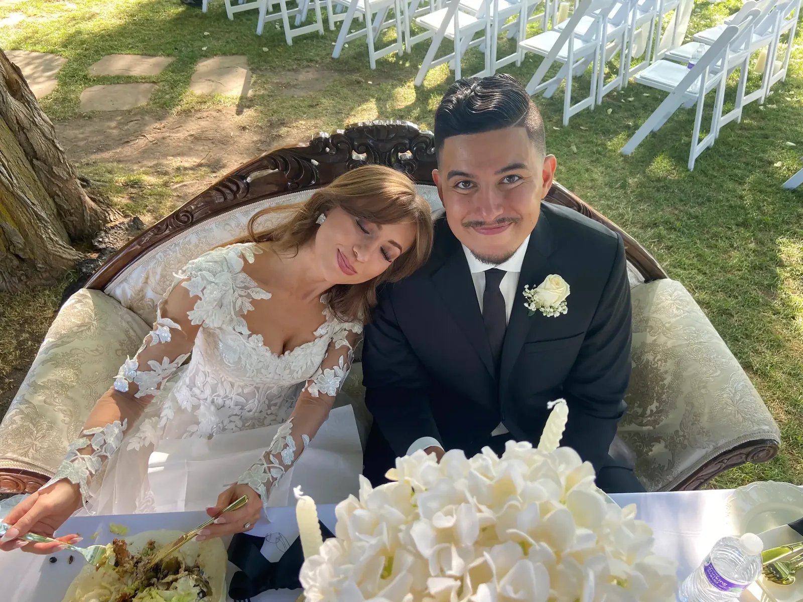 Groom wearing custom tailored charcoal suit by esatto Custom at his wedding