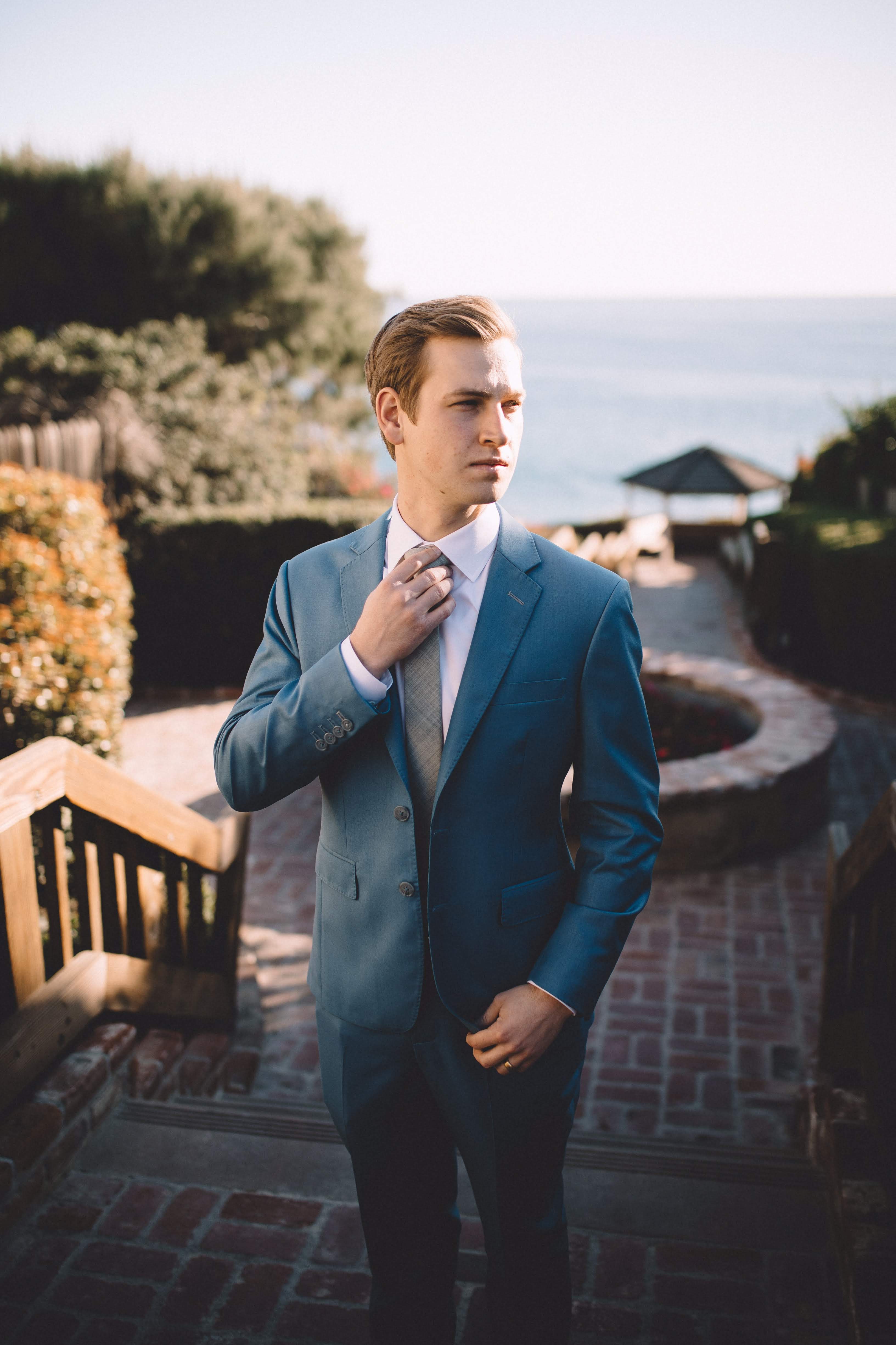 Groom in custom wedding suit