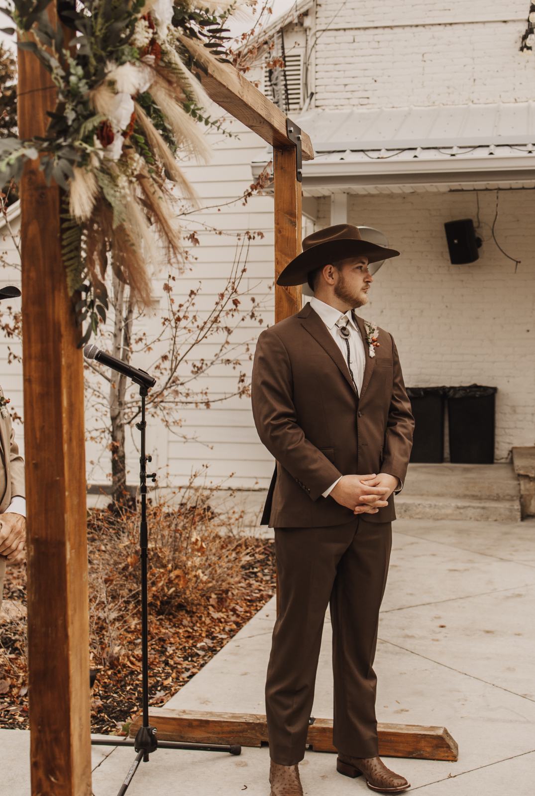 Groom in custom wedding suit